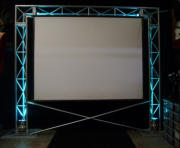 Wash-lit Aluminium Tri Truss used to hang a large screen