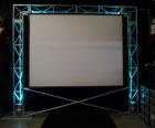 Wash-lit Aluminium Tri Truss used to hang a large screen